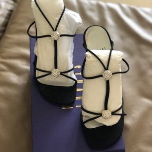 Black peau d’sorie evening shoes.